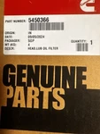 5450366 Filter Head Genuine Cummins. Fixed Price $140.00.