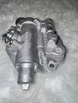 Genuine Audi Oil Pump 06H-115-105-DF. Fixed Price $300.00.