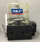 Skf Lincoln KFA1-W+924 Lubrication Piston Pump W/ Resevoir 24VDC (R108). Fixed Price $1300.00.